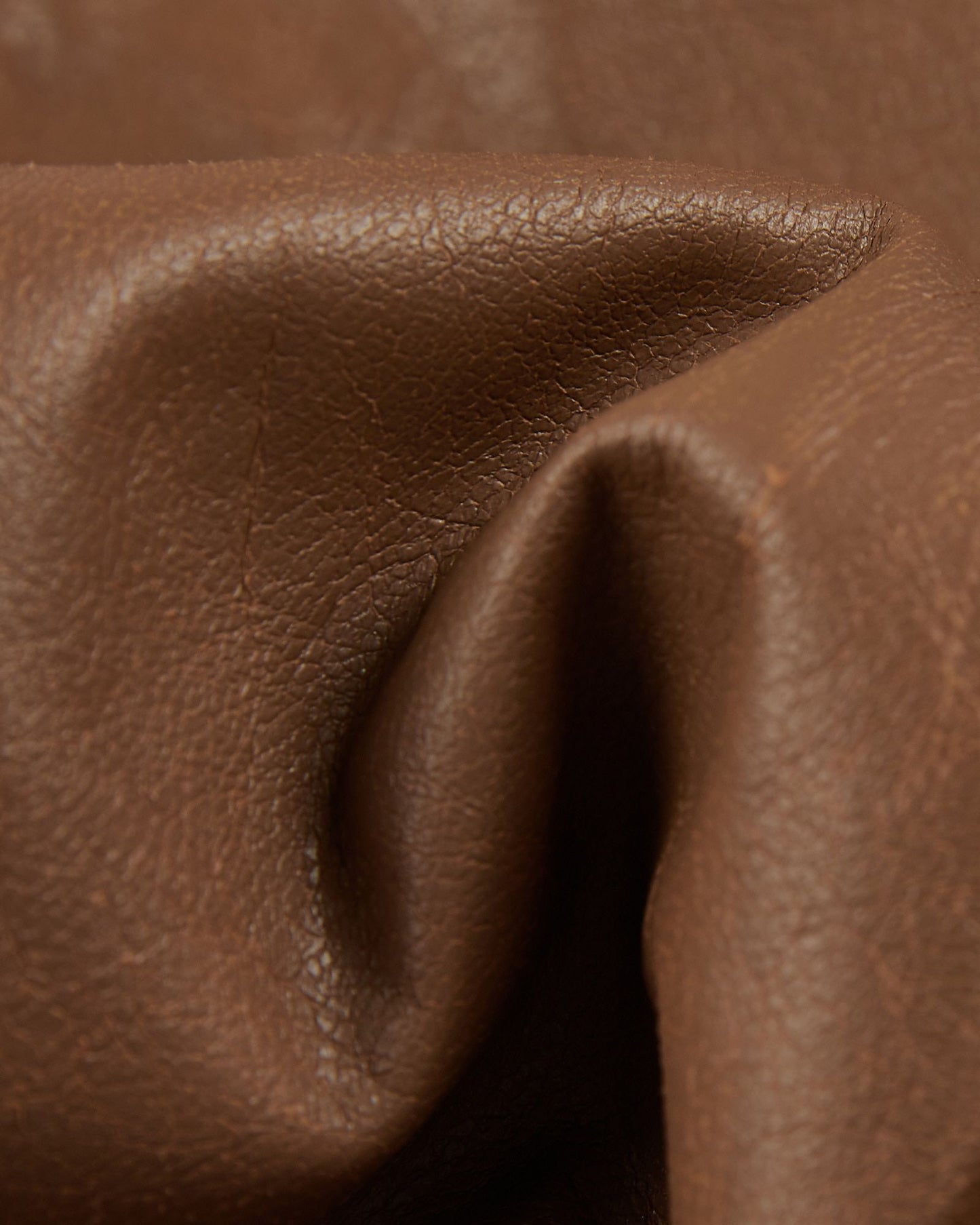 Slim fit trousers in stretch faux leather