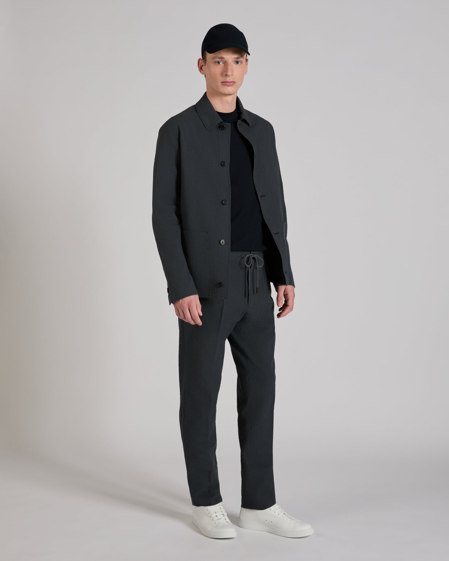 Tapered fit stretch cotton and silk seersucker trousers