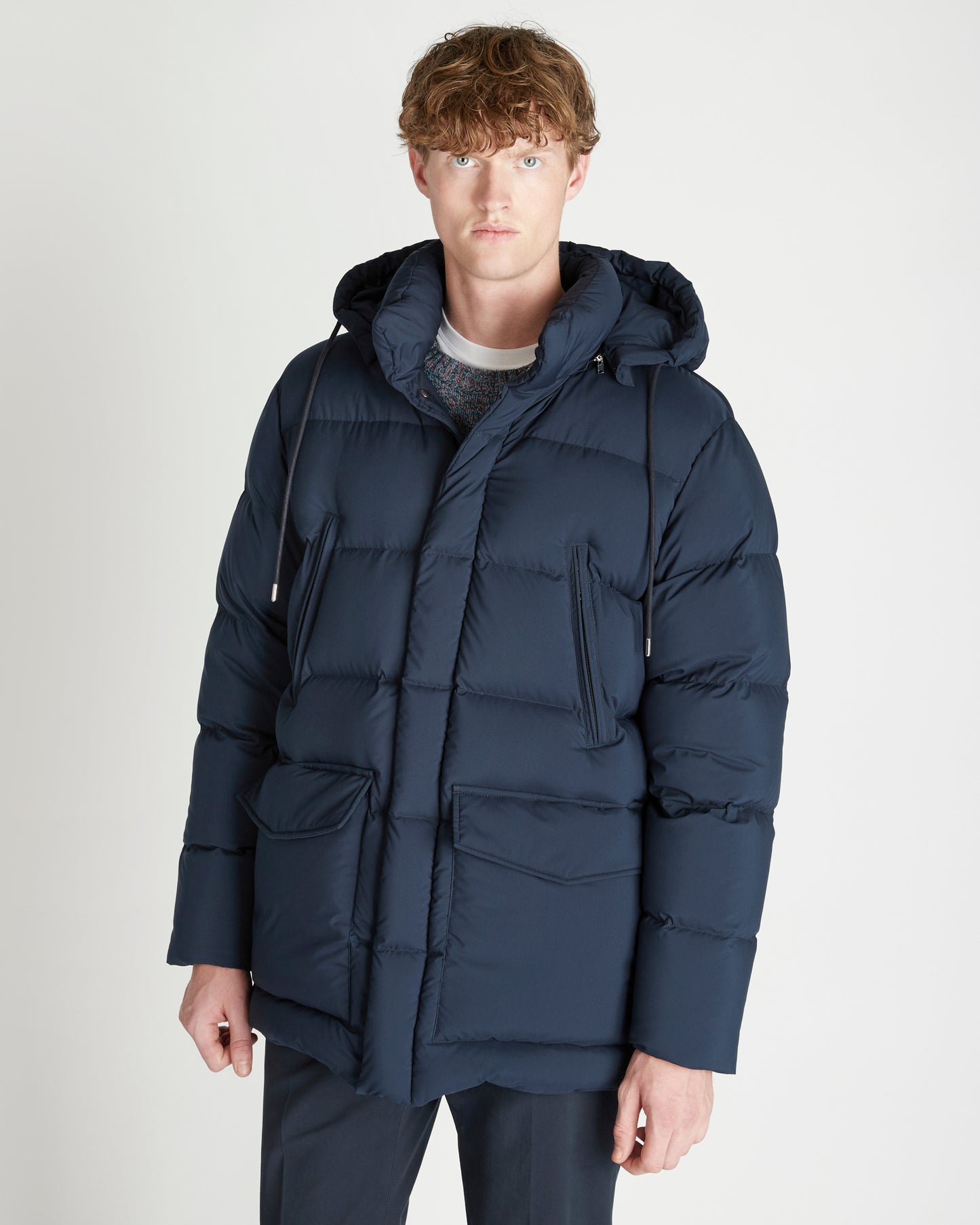 Piumino lungo in tessuto tecnico e imbottitura