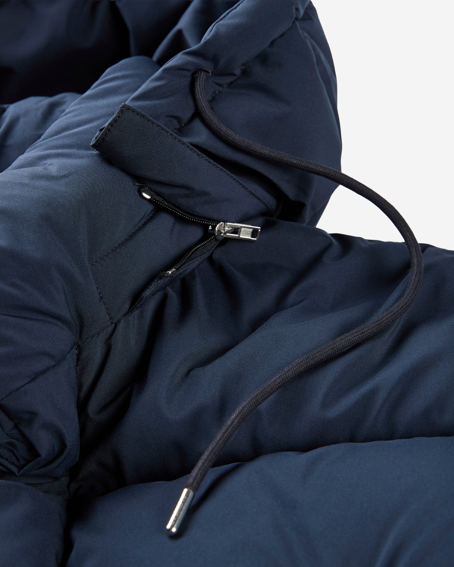 Piumino lungo in tessuto tecnico e imbottitura