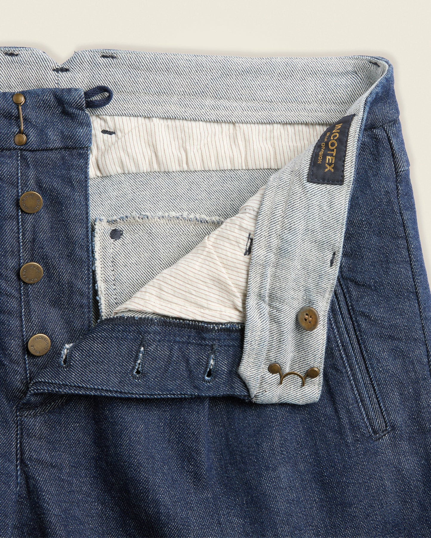 Tapered fit stretch denim trousers