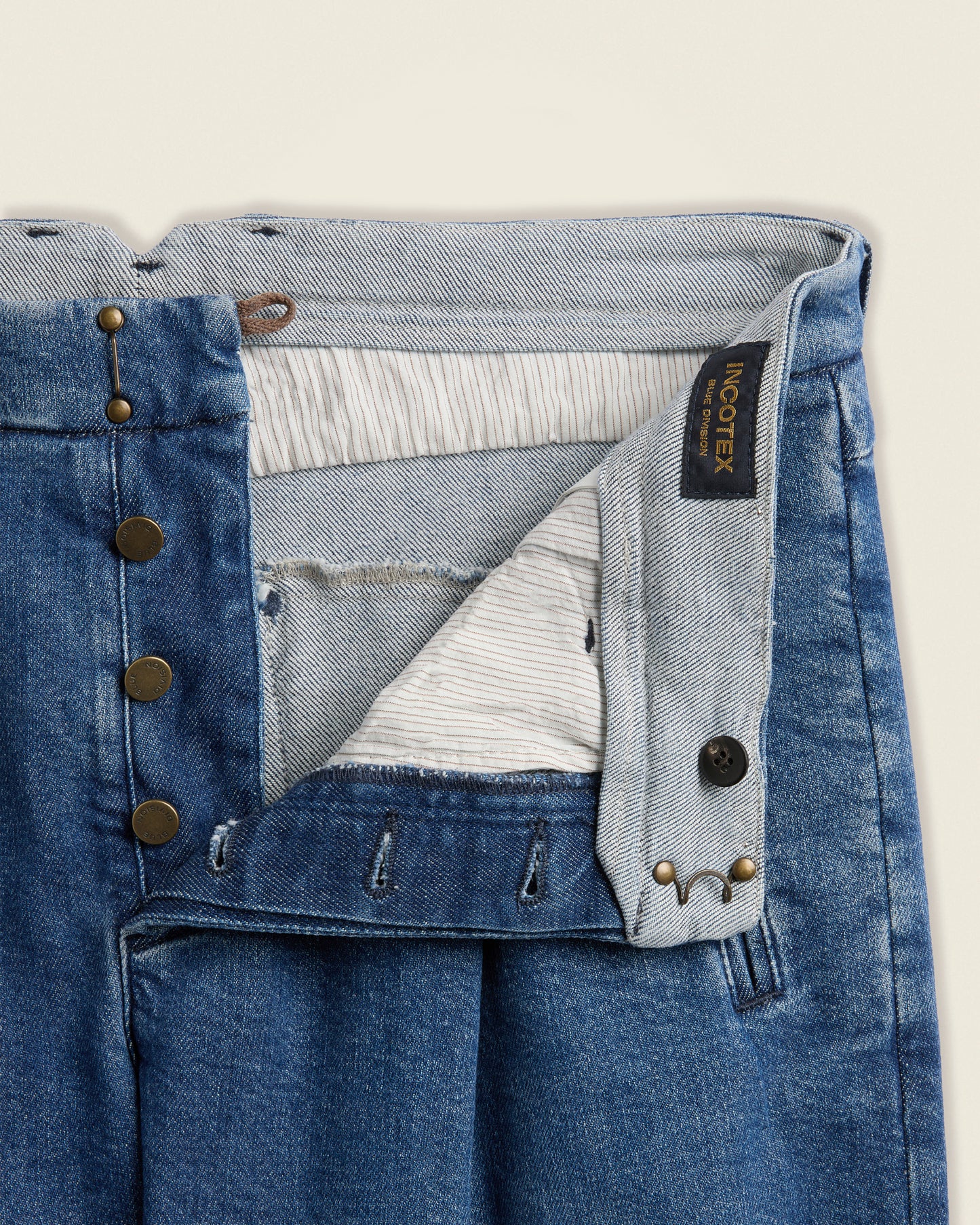Tapered fit stretch denim trousers