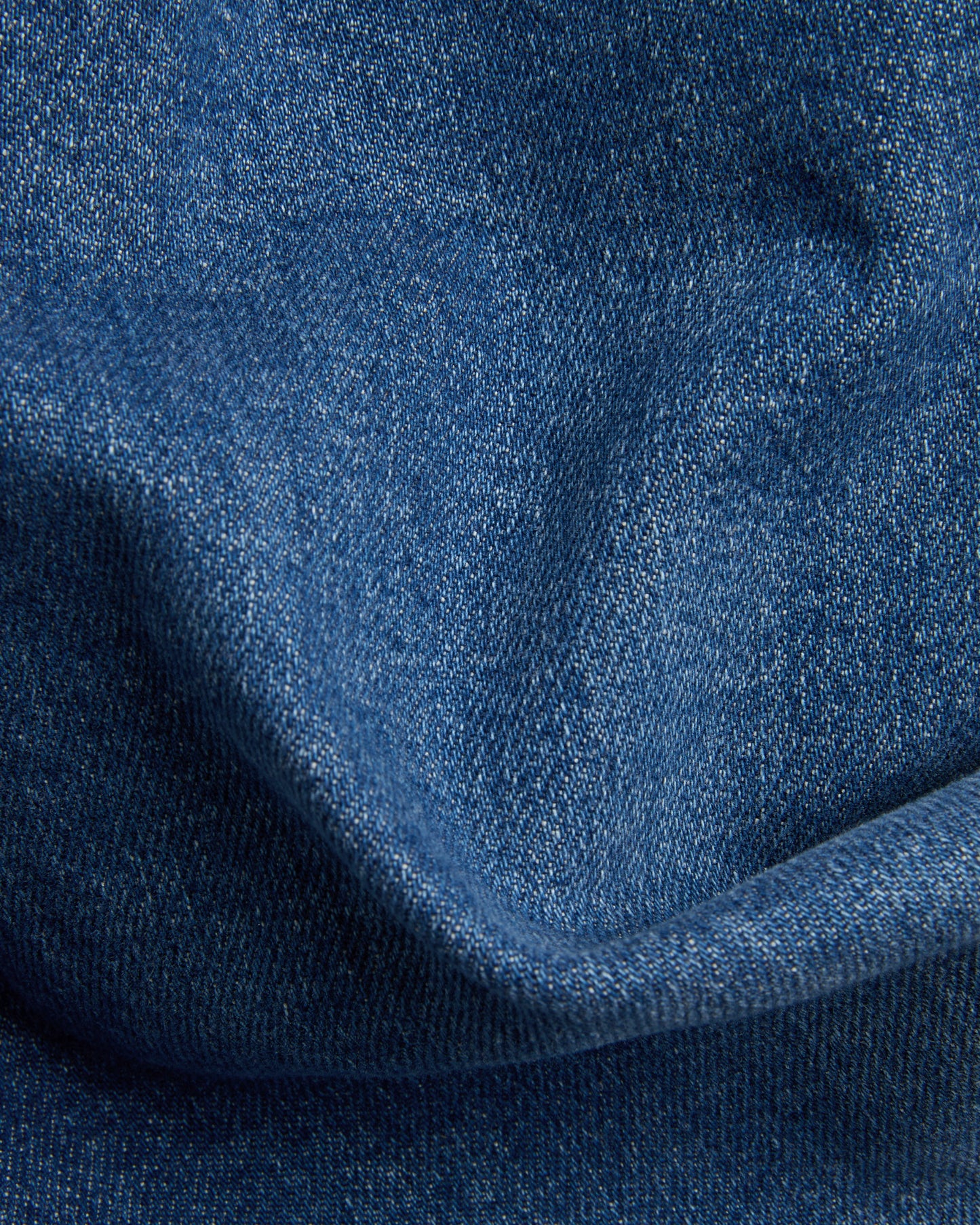 Tapered fit stretch denim trousers